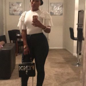 White ruffle sleeve body suit